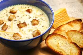 Cheese soup and bread with cream cheese